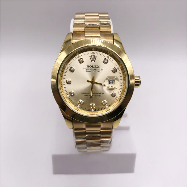 Gold Rolex Watch - TC 19